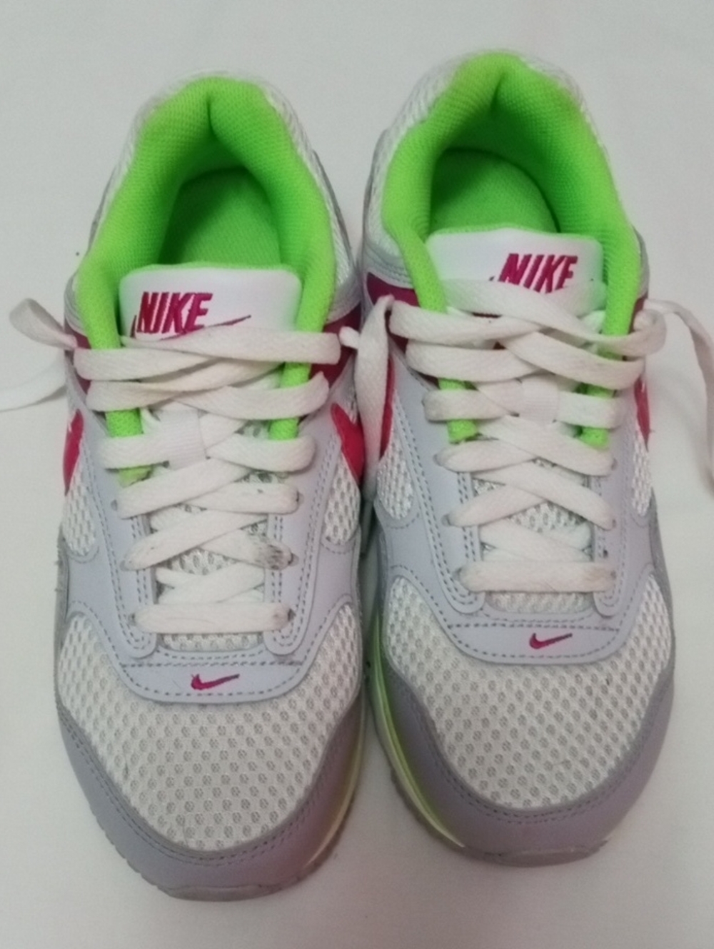 Nike Kids White Sneakers with Neon Green and Pink Accents